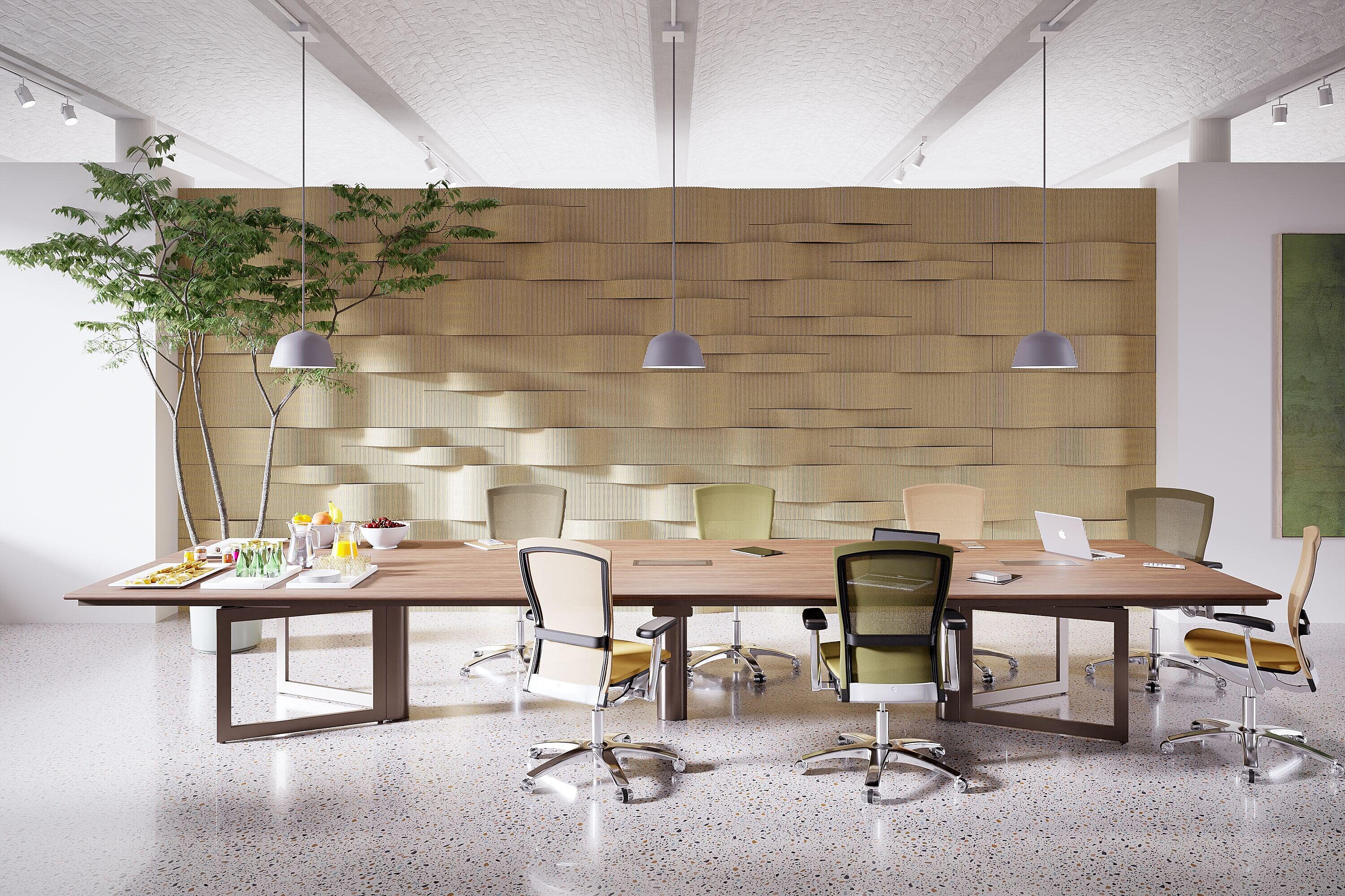 Conference desk, with textured wall in back ground and executive chairs casually placed